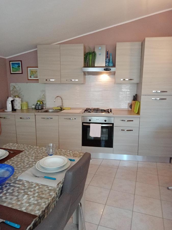 Casa Vacanza Le 2 Isole Suni Eksteriør bilde