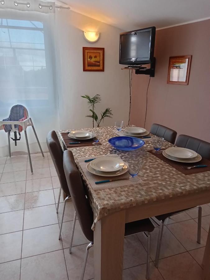 Casa Vacanza Le 2 Isole Suni Eksteriør bilde